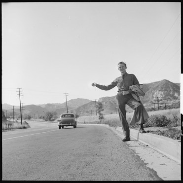 lossy-page1-480px-San_Fernando,_California._Hitch-hiking._This_Civilian_Conservation_Corps_boy_is_returning_to_camp_about_thirty_miles..._-_NARA_-_532087.tif